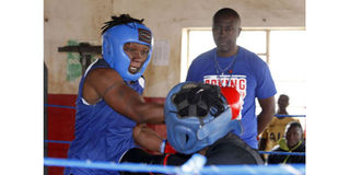 Coach Benjamin Musa and Elizabeth Andiego