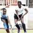 Kenyatta University's Gloria Juma (left) vies for the ball with Blazers' Rachel Ousa