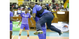 KPA player David Thuita lifts coach Sammy Mulinge