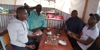 Nation Sport crew share a meal with volleyball legends Moses Wathi and Nicodemus Wang'ondu