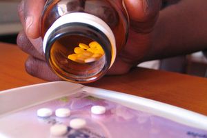 Pharmacist dispenses drugs