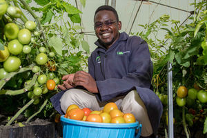 Derrick cannot hide his joy as he harvests
