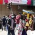 City resident walk along Tom Mboya Street, Nairobi