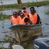 Holidaymakers ride a boat on Lake Naivasha as they celebrate Christmas.