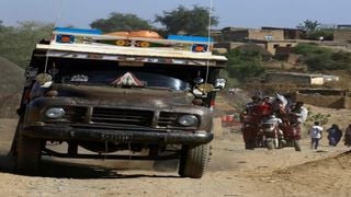 Ethiopian refugees who fled the fighting in the Tigray region head to a reception center in Hamdayit, Sudan, in November 2020.