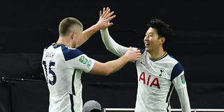 Tottenham striker Son celebrates with teammate Eric Dier