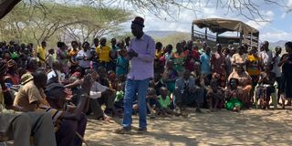 Turkana South MP James Lomenen addresses Kapedo residents on Sunday before the attack.