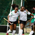 Kenya women hockey team player Caroline Guchu (left) celebrates with teammate Flavia Mutiva after scoring 