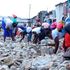 Workers fix the Enterprise-Gatoto road in Mukuru Kwa Reuben