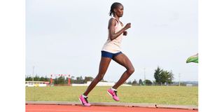 World marathon record holder Brigid Kosgei does speed work