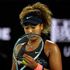 Japan's Naomi Osaka celebrates after winning against Romania's Patricia Maria Tig 