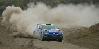 Kenya’ Onkar Rai navigated by Drew Sturrock steers his Volkswagen Polo during the SS15 stage