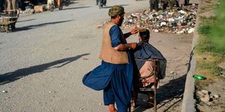 A barber in Herat, Afghanistan.