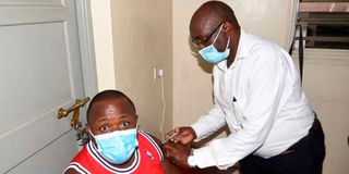 A man receiving a vaccine