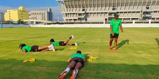 Members of the national women’s rugby team train in Tokyo under strength and conditioning coach Samuel Kimotho