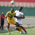 Mali's forward Ibrahima Kone vies for the ball with Kenya's defender Eric Ouma 