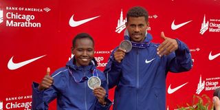 Chicago Marathon champions Seifu Tura and Ruth Chepng'etich
