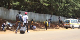 Students leave the Moi University main campus