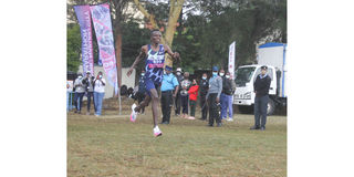 Daniel Simiyu heads to the finish line to complete the 21km race during the Stanbic Nakuru City Marathon