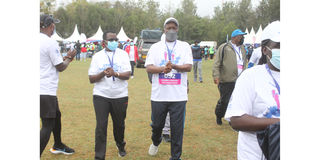 Nakuru Governor Lee Kinyanjui (centre) arrives at the Rift Valley Sports Club grounds