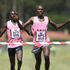 Rhonex Kipruto (right) crosses the line to win the men's 10km race ahead of Michael Kibet 