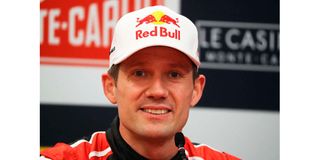 French driver Sebastien Ogier speaks during a press conference 