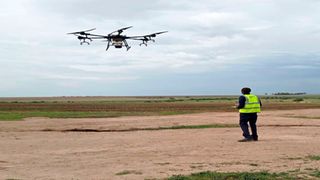 Technician using a drone