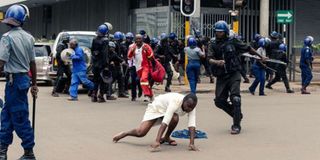 Police disperse protesters in Zimbabwe's capital Harare.