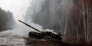 Smoke rises from a Russian tank in UKraine