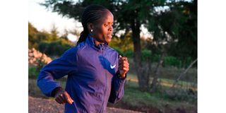 Brigid Kosgei trains