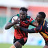 Kenya Chipu right centre Mathias Osimbo (left) vies with Uganda's left wing Steven Kalema