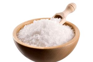 To make saltwater, add half a teaspoon of salt to a cup of warm water and stir.
