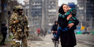 Russian soldiers in a street of Mariupol