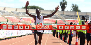 Brimin Kipkorir Misoi wins the men's 42km race