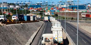 Cargo trucks queue at entrance of KPA Gate 24 