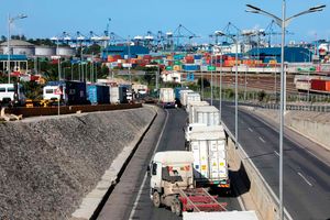 Cargo trucks queue at entrance of KPA Gate 24 