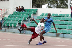 Polycarp Rakama (left) of Technical University of Kenya vies with Augustine Okwiri of General Service Unit 