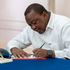 President Uhuru Kenyatta signing parliamentary Bills 