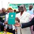 Meru Governor Kiraitu Murungi displays the Timau Municipality Charter.