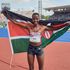 Emily Ngii celebrates after winning a bronze medal