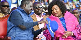 Raila Odinga with his wife Ida Odinga at the coalition's final mega rally at Kasarani