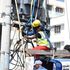 Kenya Power staff work on restoring power in the Ganjoni area in Mombasa County.