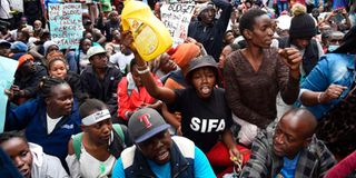 Kenyans protest outside the Office of the President in Nairobi on July 7, 2022, over the high cost of living.