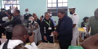 President Uhuru Kenyatta casting his vote 