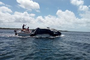 boat passing through Manda Bruno channel in Lamu