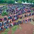 Residents queue to cast their votes at the Kenyatta Sportsgrouns polling station in Kisumu County.