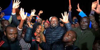 Japheth Nyakundi (centre) of UDA celebrates with his supporters.