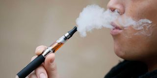 A person smoking cigarette.