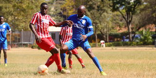 FC Talanta midfielder Alex Lughanji (left) vies with Bandari midfielder Whyvonne Isuza