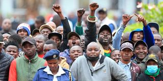 Nairobi residents cheer during the swearing-in ceremony of Governor Johnson Sakaja.